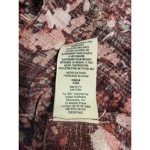 Free People Romper SZ Large All The Right Ruffles Faux Wrap Dark Floral Coquette - Picture 13 of 14